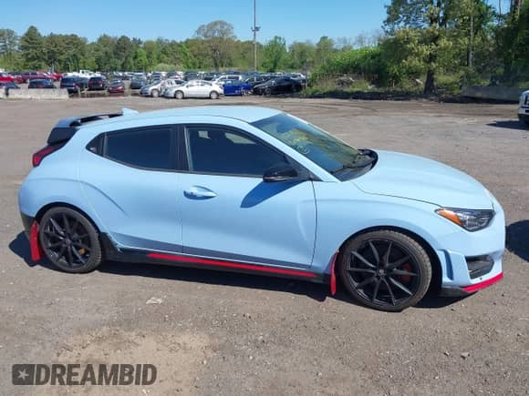 2020 Hyundai Veloster z VIN KMHT36AH8LU003913, wystawiony jako IAAI lot #42217722 z przebiegiem 33 996 mil mil oraz . Historia ofert i sprzedaży dostępna na DreamBid. Obrazek 13.