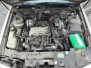 ✅ 1997 Buick Skylark • VIN: 1G4NJ52M4VC409572 • Lot: 81131735. Wystawiony na Copart z przebiegiem 49 345 mil. Bezpłatny archiwum sprzedaży aukcyjnych z USA i szczegółowy raport historii pojazdu na DreamBid. Zdjęcie 11.