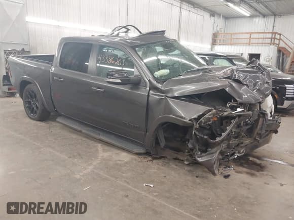 ✅ 2021 Ram 1500 Laramie • VIN: 1C6SRFJT7MN504877 • Lot: 43386203. Listed on IAAI with 181,844 mi. Free auction sales archive from the USA and detailed vehicle history report at DreamBid. Image 1.