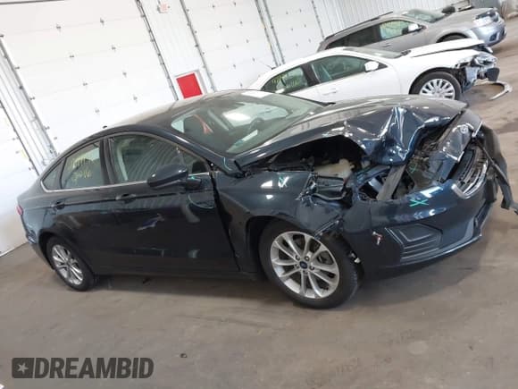 ✅ 2020 Ford Fusion SE • VIN: 3FA6P0HD9LR149787 • Lot: 42199141. Listed on IAAI with 69,466 mi. Free auction sales archive from the USA and detailed vehicle history report at DreamBid. Image 13.