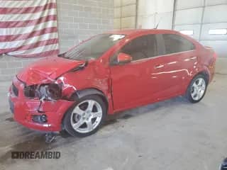 2013 Chevrolet Sonic LTZ с VIN 1G1JE5SG0D4164711, выставлен на аукционе Copart как лот 81845895 с пробегом 136 844 миль миль и Списание • Salvage title. История ставок и продаж доступна на DreamBid. Изображение 1.