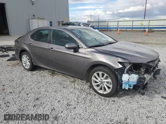 2022 Toyota Camry LE с VIN 4T1C11AK5NU700236, выставлен на аукционе Copart как лот 85125065 с пробегом 41 325 миль миль и Списание • Salvage title. История ставок и продаж доступна на DreamBid. Изображение 4.