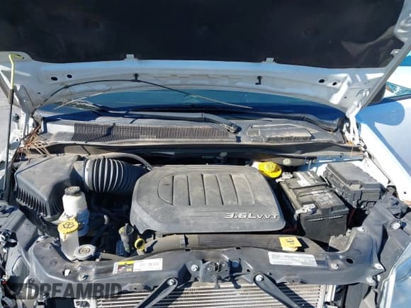 ✅ 2018 Dodge Grand Caravan SE • VIN: 2C4RDGBG7JR323905 • Lot: 43613740. Wystawiony na IAAI z przebiegiem 71 890 mil. Bezpłatny archiwum sprzedaży aukcyjnych z USA i szczegółowy raport historii pojazdu na DreamBid. Zdjęcie 10.