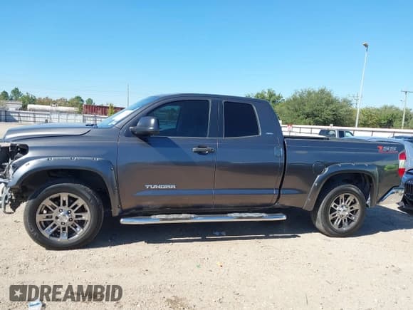 ✅ 2016 Toyota Tundra SR • VIN: 5TFRM5F19GX095457 • Lot: 43593252. Listed on IAAI with 206,354 mi. Free auction sales archive from the USA and detailed vehicle history report at DreamBid. Image 15.