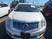 ✅ 2014 Cadillac SRX Performance Collection • VIN: 3GYFNCE37ES631757 • Lot: 43593230. Listed on IAAI with 104,628 mi. Free auction sales archive from the USA and detailed vehicle history report at DreamBid. Image 12.