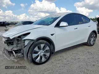 ✅ 2022 Tesla Model Y Long Range • VIN: 7SAYGDEE6NF327170 • Lot: 82334885. Listed on Copart with 76,961 mi. Free auction sales archive from the USA and detailed vehicle history report at DreamBid. Image 1.