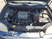 ✅ 2004 Hyundai Santa Fe GLS • VIN: KM8SC13E54U700457 • Lot: 53755855. Listed on Copart with 101,565 mi. Free auction sales archive from the USA and detailed vehicle history report at DreamBid. Image 12.