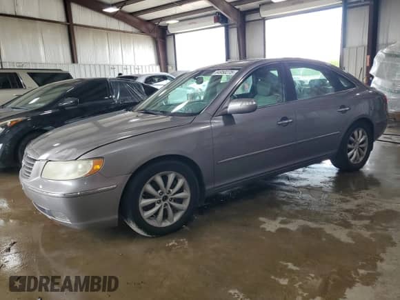 2008 Hyundai Azera Limited с VIN KMHFC46F98A254456, выставлен на аукционе Copart как лот 64950275 с пробегом 228 638 миль миль и Чистый • Clean title. История ставок и продаж доступна на DreamBid. Изображение 1.