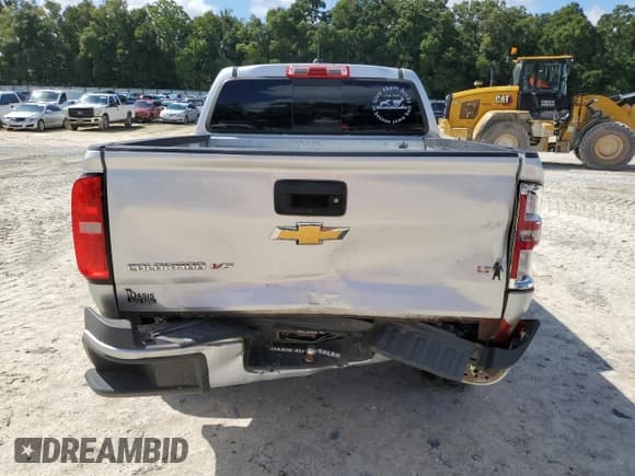 ✅ 2020 Chevrolet Colorado 2WD LT • VIN: 1GCGSCEN4L1206256 • Lot: 68600164. Wystawiony na Copart z przebiegiem 56 296 mil. Bezpłatny archiwum sprzedaży aukcyjnych z USA i szczegółowy raport historii pojazdu na DreamBid. Zdjęcie 6.