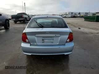 2004 Hyundai Accent GL with VIN KMHCG35CX4U293817, listed as a Copart auction lot 86087074 with Not provided miles and Salvage title. Bid and sale history available at DreamBid. Image 6.