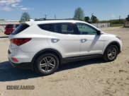 ✅ 2018 Hyundai Santa Fe 2.4L • VIN: 5NMZU3LB0JH060954 • Лот: 51750544. Опубликован ранее на Copart с пробегом 123 970 миль. Бесплатный доступ к архиву аукционных продаж из США и подробный отчёт об истории автомобиля на DreamBid. Изображение 3.