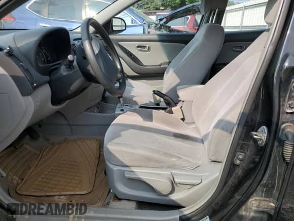 2007 Hyundai Elantra GLS z VIN KMHDU46D57U129969, wystawiony jako Copart lot #65534884 z przebiegiem 183 733 mil mil oraz Szkoda całkowita • Salvage title. Historia ofert i sprzedaży dostępna na DreamBid. Obrazek 7.