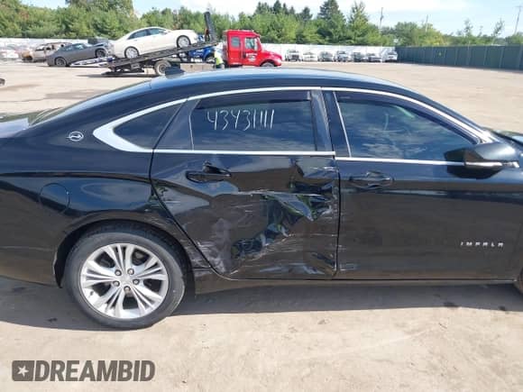 2014 Chevrolet Impala LT z VIN 1G1125S32EU152096, wystawiony jako IAAI lot #43431111 z przebiegiem 122 494 mil mil oraz . Historia ofert i sprzedaży dostępna na DreamBid. Obrazek 6.