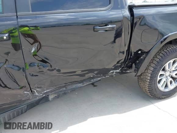 2020 Ram 1500 Laramie with VIN 1C6RREJT2LN295149, listed as a IAAI auction lot 42411146 with 113,445 mi miles and . Bid and sale history available at DreamBid. Image 6.