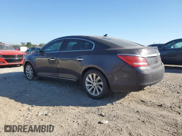 ✅ 2014 Buick LaCrosse Leather • VIN: 1G4GB5GR7EF212548 • Лот: 82503515. Опубликован ранее на Copart с пробегом 145 336 миль. Бесплатный доступ к архиву аукционных продаж из США и подробный отчёт об истории автомобиля на DreamBid. Изображение 2.