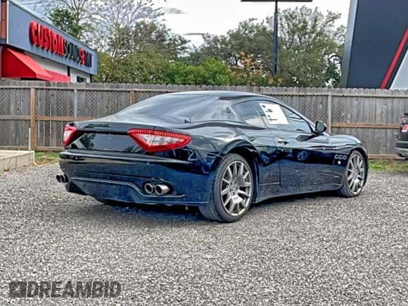 ✅ 2008 Maserati GranTurismo • VIN: ZAMGJ45A480037130 • Lot: 96158535. Listed on Copart with 12,797 mi. Free auction sales archive from the USA and detailed vehicle history report at DreamBid. Image 4.