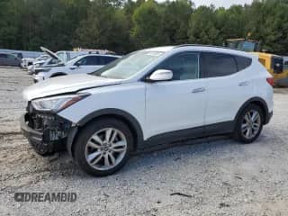 2014 Hyundai Santa Fe с VIN 5XYZU3LAXEG215274, выставлен на аукционе Copart как лот 84610835 с пробегом 101 685 миль миль и Списание • Salvage title. История ставок и продаж доступна на DreamBid. Изображение 1.