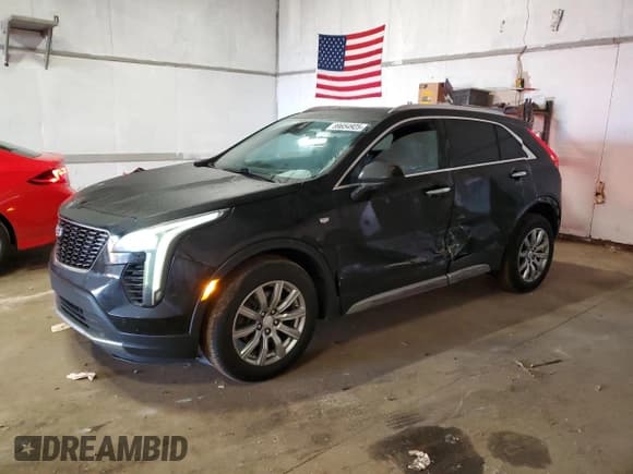 ✅ 2020 Cadillac XT4 AWD Premium Luxury • VIN: 1GYFZDR47LF128163 • Лот: 89654925. Опубликован ранее на Copart с пробегом 53 104 миль. Бесплатный доступ к архиву аукционных продаж из США и подробный отчёт об истории автомобиля на DreamBid. Изображение 1.