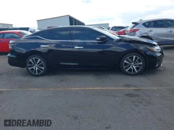 ✅ 2021 Nissan Maxima SV • VIN: 1N4AA6CV4MC511989 • Lot: 43215195. Listed on IAAI with 85,232 mi. Free auction sales archive from the USA and detailed vehicle history report at DreamBid. Image 13.