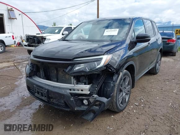 ✅ 2021 Honda Passport EX-L • VIN: 5FNYF8H51MB019230 • Lot: 42332147. Listed on IAAI with 36,733 mi. Free auction sales archive from the USA and detailed vehicle history report at DreamBid. Image 6.