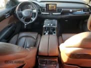 ✅ 2015 Audi A8 3.0T • VIN: WAU3GAFD1FN017875 • Лот: 88210815. Опубликован ранее на Copart с пробегом 124 720 миль. Бесплатный доступ к архиву аукционных продаж из США и подробный отчёт об истории автомобиля на DreamBid. Изображение 8.