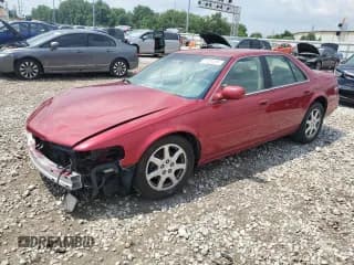 ✅ 2002 Cadillac Seville Touring STS • VIN: 1G6KY549X2U251811 • Лот: 61204415. Опубликован ранее на Copart с пробегом 85 087 миль. Бесплатный доступ к архиву аукционных продаж из США и подробный отчёт об истории автомобиля на DreamBid. Изображение 1.