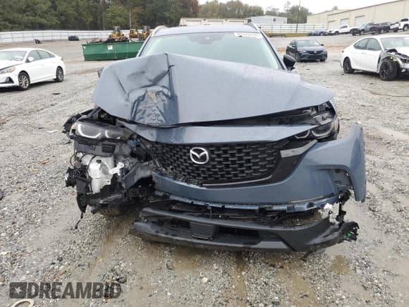 ✅ 2023 Mazda CX-50 S Preferred Plus • VIN: 7MMVABCM9PN112757 • Lot: 90320495. Listed on Copart with 57,072 mi. Free auction sales archive from the USA and detailed vehicle history report at DreamBid. Image 5.