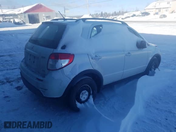 ✅ 2013 Suzuki SX4 Crossover • VIN: JS2YB5A34D6101523 • Lot: 83203184. Wystawiony na Copart z przebiegiem 114 057 mil. Bezpłatny archiwum sprzedaży aukcyjnych z USA i szczegółowy raport historii pojazdu na DreamBid. Zdjęcie 3.