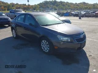 ✅ 2011 Chevrolet Cruze LS • VIN: 1G1PC5SH4B7195769 • Lot: 43610499. Listed on IAAI with 106,439 mi. Free auction sales archive from the USA and detailed vehicle history report at DreamBid. Image 1.