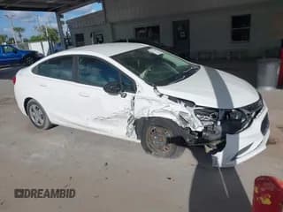 ✅ 2018 Chevrolet Cruze LS • VIN: 1G1BC5SM7J7144353 • Lot: 43411286. Listed on IAAI with 120,012 mi. Free auction sales archive from the USA and detailed vehicle history report at DreamBid. Image 1.