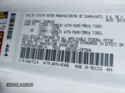 ✅ 2021 Toyota Tacoma SR • VIN: 3TYRZ5CN8MT008114 • Lot: 42993504. Listed on IAAI with 24,344 mi. Free auction sales archive from the USA and detailed vehicle history report at DreamBid. Image 9.