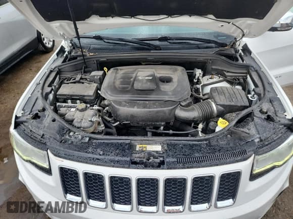 ✅ 2016 Jeep Grand Cherokee Overland • VIN: 1C4RJFCG5GC385029 • Lot: 80877655. Listed on Copart with 111,235 mi. Free auction sales archive from the USA and detailed vehicle history report at DreamBid. Image 12.