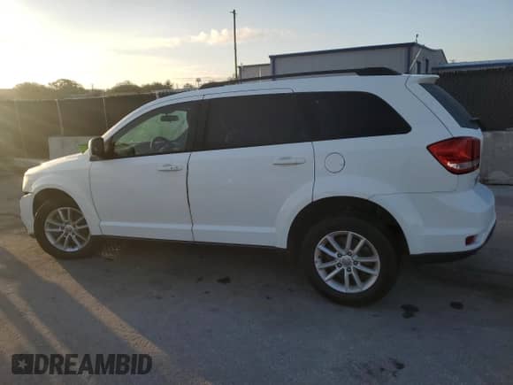 2015 Dodge Journey SXT z VIN 3C4PDCBG2FT610363, wystawiony jako Copart lot #86847885 z przebiegiem 128 271 mil mil oraz Szkoda całkowita • Salvage title. Historia ofert i sprzedaży dostępna na DreamBid. Obrazek 2.