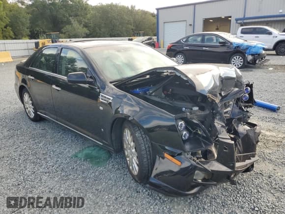 ✅ 2009 Cadillac STS RWD • VIN: 1G6DK67V990134795 • Lot: 69980414. Wystawiony na Copart z przebiegiem 108 739 mil. Bezpłatny archiwum sprzedaży aukcyjnych z USA i szczegółowy raport historii pojazdu na DreamBid. Zdjęcie 4.