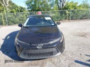 ✅ 2021 Toyota Corolla LE • VIN: 5YFEPMAE9MP242137 • Lot: 43702103. Listed on IAAI with 98,625 mi. Free auction sales archive from the USA and detailed vehicle history report at DreamBid. Image 12.