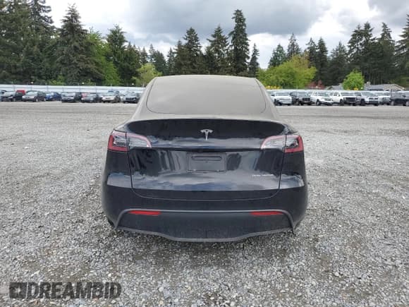 ✅ 2024 Tesla Model Y Long Range • VIN: 7SAYGDEE7RF985344 • Лот: 56403855. Опубликован ранее на Copart с пробегом 27 596 миль. Бесплатный доступ к архиву аукционных продаж из США и подробный отчёт об истории автомобиля на DreamBid. Изображение 6.