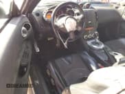 ✅ 2009 Nissan 370Z Touring • VIN: JN1AZ44E69M407031 • Лот: 75331544. Опубликован ранее на Copart с пробегом 171 288 миль. Бесплатный доступ к архиву аукционных продаж из США и подробный отчёт об истории автомобиля на DreamBid. Изображение 8.