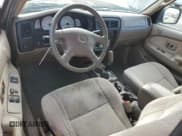 ✅ 2004 Toyota Tacoma PreRunner • VIN: 5TESM92N84Z387347 • Лот: 50037625. Опубликован ранее на Copart с пробегом 170 910 миль. Бесплатный доступ к архиву аукционных продаж из США и подробный отчёт об истории автомобиля на DreamBid. Изображение 9.