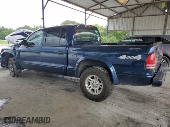 2004 Dodge Dakota Sport с VIN 1D7HG38N14S510552, выставлен на аукционе Copart как лот 63930474 с пробегом 111 011 миль миль и Списание • Salvage title. История ставок и продаж доступна на DreamBid. Изображение 2.