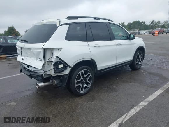 ✅ 2022 Honda Passport Elite • VIN: 5FNYF8H05NB005143 • Lot: 43278053. Listed on IAAI with 89,426 mi. Free auction sales archive from the USA and detailed vehicle history report at DreamBid. Image 4.