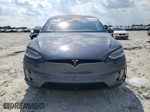 ✅ 2017 Tesla Model X 90D • VIN: 5YJXCDE23HF044191 • Lot: 70591435. Wystawiony na Copart z przebiegiem 103 208 mil. Bezpłatny archiwum sprzedaży aukcyjnych z USA i szczegółowy raport historii pojazdu na DreamBid. Zdjęcie 5.