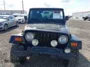 ✅ 2002 Jeep Wrangler Sahara • VIN: 1J4FA59S62P756767 • Lot: 43730556. Listed on IAAI with 145,681 mi. Free auction sales archive from the USA and detailed vehicle history report at DreamBid. Image 13.
