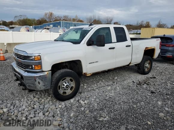 ✅ 2015 Chevrolet Silverado 2500HD Work Truck • VIN: 1GC2KUEG7FZ554320 • Lot: 90840235. Listed on Copart with 203,982 mi. Free auction sales archive from the USA and detailed vehicle history report at DreamBid. Image 1.