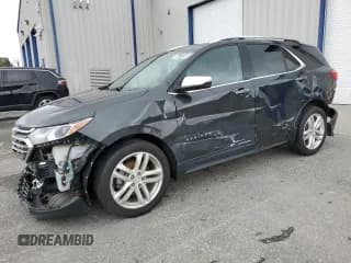 ✅ 2020 Chevrolet Equinox Premier • VIN: 3GNAXPEX2LS588048 • Лот: 80175905. Опубликован ранее на Copart с пробегом 124 723 миль. Бесплатный доступ к архиву аукционных продаж из США и подробный отчёт об истории автомобиля на DreamBid. Изображение 1.