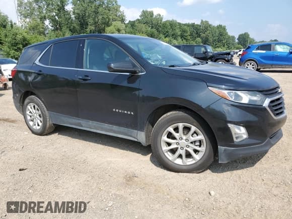 ✅ 2020 Chevrolet Equinox LT • VIN: 2GNAXJEV0L6121592 • Lot: 69063545. Listed on Copart with 93,637 mi. Free auction sales archive from the USA and detailed vehicle history report at DreamBid. Image 4.