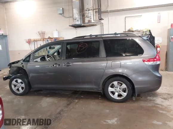 ✅ 2012 Toyota Sienna LE • VIN: 5TDKK3DC5CS183728 • Lot: 43790834. Listed on IAAI with 213,960 mi. Free auction sales archive from the USA and detailed vehicle history report at DreamBid. Image 15.