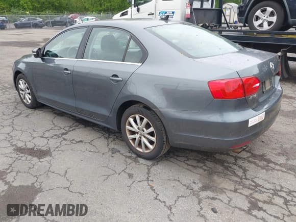 ✅ 2013 Volkswagen Jetta SE • VIN: 3VWDX7AJ3DM397748 • Lot: 42283421. Listed on IAAI with 195,928 mi. Free auction sales archive from the USA and detailed vehicle history report at DreamBid. Image 3.