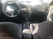 ✅ 2001 Hyundai Elantra GLS • VIN: KMHDN45D41U213366 • Lot: 61075025. Wystawiony na Copart z przebiegiem 211 374 mil. Bezpłatny archiwum sprzedaży aukcyjnych z USA i szczegółowy raport historii pojazdu na DreamBid. Zdjęcie 8.