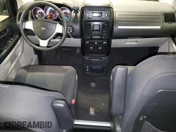 ✅ 2009 Dodge Grand Caravan SE • VIN: 2D8HN44E99R542025 • Lot: 61003595. Wystawiony na Copart z przebiegiem 222 476 mil. Bezpłatny archiwum sprzedaży aukcyjnych z USA i szczegółowy raport historii pojazdu na DreamBid. Zdjęcie 8.