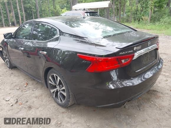 ✅ 2016 Nissan Maxima Platinum • VIN: 1N4AA6AP2GC902549 • Lot: 42965005. Listed on IAAI with 77,530 mi. Free auction sales archive from the USA and detailed vehicle history report at DreamBid. Image 3.